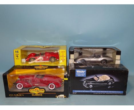 Four boxed 1/18 scale diecast sports cars: Ertl 1935 Auburn, Revell Ferrari 330 P4, Tchib BMW502 and UT Models Chevrolet, (bo