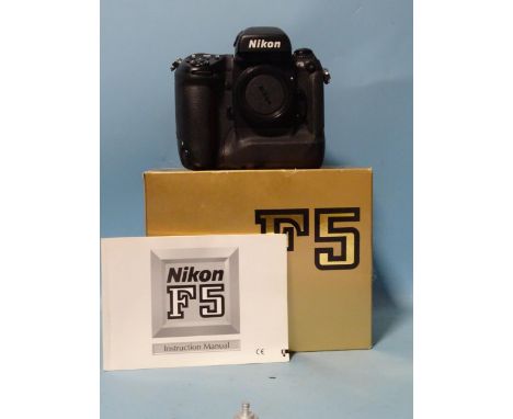 A Nikon F5 camera body, (boxed, with manual). 