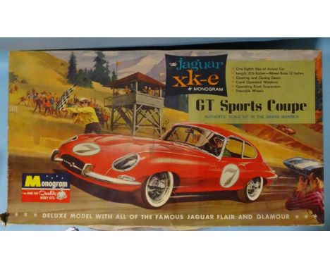 Monogram, a vintage 1/8 scale plastic kit, Jaguar XK-e GT Sports Coupe,&nbsp;(boxed, box torn, unchecked, appears complete). 