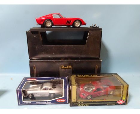 Revell, 1/12 scale no.8850 '64 Ferrari 250 GTO, (boxed) and two 1/18 diecast cars by Kyosho and Guiloy, (all boxed), (3). 