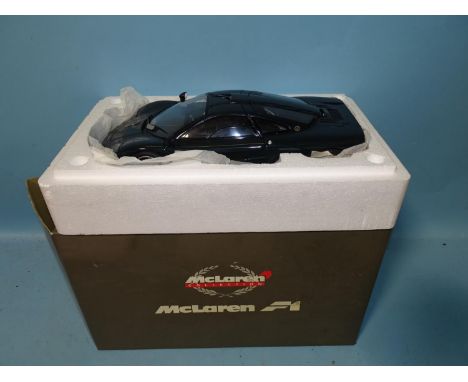 Paul's Model Art, 1:12 scale McLaren F1 Sports/Road Car, dark metallic green, (boxed with packing, mint). 
