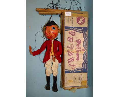 A rare early-1950's Pelham Puppet "Mr Huntsman", with original clothing, (lack moustache), (boxed, box poor). 