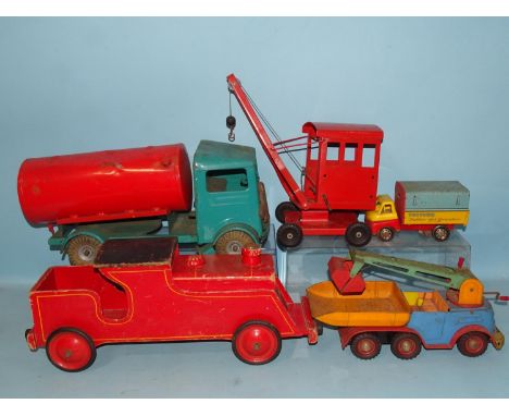 A 1950's Blomer &amp; Schuler tinplate c/w six-wheeled dumper truck, (in poor condition), a Wells Brimtoy "Toytown Painters &