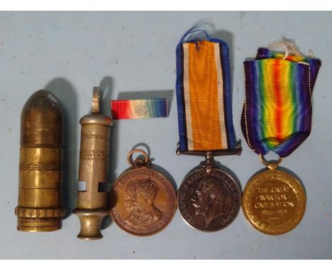 A WWI pair, British War and Victory medals awarded to 141643 2AM C Hanson RAF, a 1935 Silver Jubilee medallion, a trench art 
