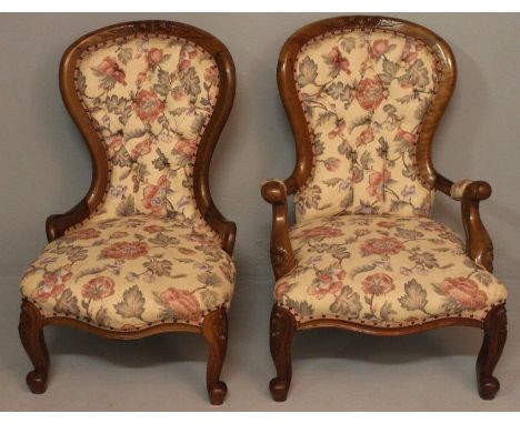 A PAIR OF VICTORIAN MAHOGANY GRANDFATHER AND GRANDMOTHER CHAIRS, the hooped backs with carved top-rails, with deep button uph