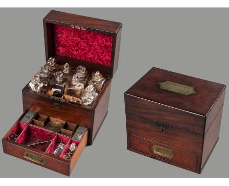 A 19TH CENTURY MAHOGANY APOTHECARY CASE, fitted with numerous divisions and a shallow drawer, tin cannisters, bottles of vari