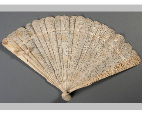 A CHINESE IVORY BRISÉ FAN, comprising nineteen sticks and two guards all engraved with scenes of figures in gardens, Cantones