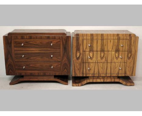 A NEAR PAIR OF ART DECO WALNUT AND MAHOGANY PEDESTAL CHESTS, Circa 1930's, each with a caddy top, three long drawers and stan