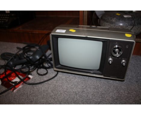 A VINTAGE PHILIPS TV ETTE WITH AERIAL &amp; MANUAL