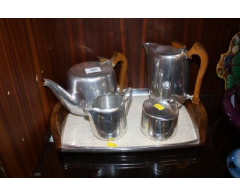 A RETRO PICQUOT WARE FOUR PIECE TEA SERVICE ON TRAY