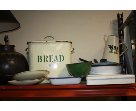 A COLLECTION OF ENAMEL KITCHENWARE TO INCLUDE TWO BREAD BINS, COOKING POTS, VINTAGE FIRST AID KIT ETC