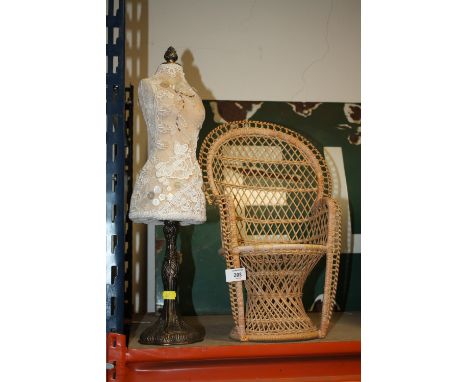 A MINIATURE/ DOLL SIZED MANNEQUIN ON STAND, TOGETHER WITH A WICKER DOLL CHAIR (2) 