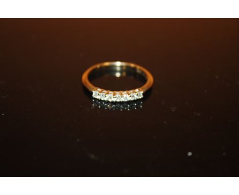 A 9CT GOLD SEVEN STONE DIAMOND RING SIZE O APPROX WEIGHT -1.8G