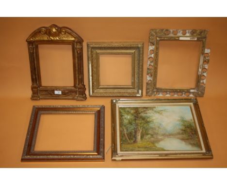 FOUR VINTAGE AND ANTIQUE PICTURE FRAMES, TOGETHER WITH A FRAMED OIL ON CANVAS OF A RIVER SCENE SIGNED C INNESS (5)
