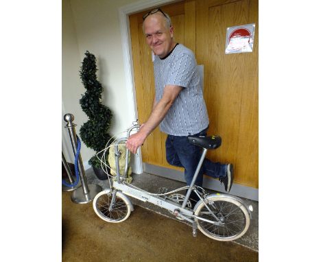 A RETRO BICKERTON PORTABLE PUSH BIKE&nbsp;COMPLETE WITH COVER AND MANUAL