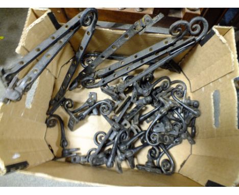 A BOX OF VINTAGE CAST METAL WINDOW CATCHES, HANDLES ETC