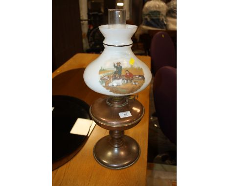 A VINTAGE COPPER OIL LAMP WITH GLASS SHADE DECORATED WITH A HUNTING SCENE 