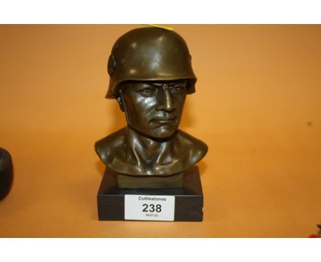 A MODERN BRONZE STYLE BUST OF A GERMAN SOLDIER