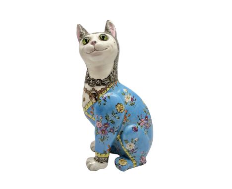 Émile Gallé (French 1846-1904): Faience model of a cat, naturalistically modelled, the head inset with green marbled glass ey