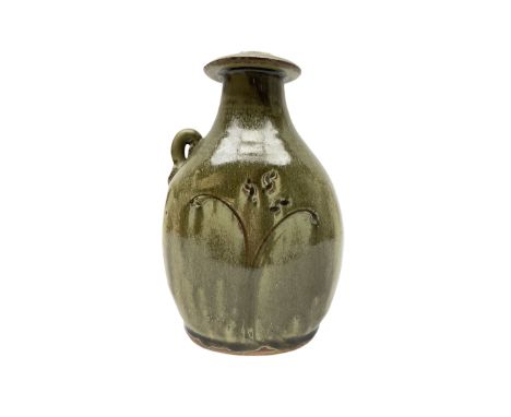 Jim Malone (British 1946-): Stoneware flask with trailing green glaze, incised floral decoration and lug handle, unmarked H20