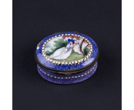 A Bilston enamel patch box, late 18th Century, of oval shape, depicting a reserve of a lady reclining beneath a tree on a mot