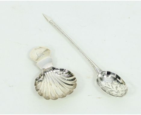 An 18th Century silver mote spoon, marks rubbed, the stem with feather edge and a Georgian caddy spoon with shell bowl