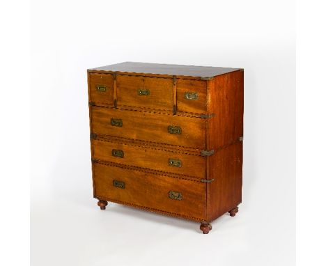 A mahogany brass bound campaign chest, with central secretaire, in two sections, on bun feet, 98.5cm wide/see illustration Co
