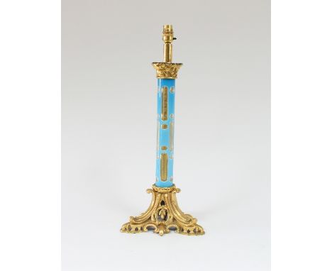 A French 19th Century gilt metal and blue overlay glass table lamp, the blue overlay glass column with stylised geometric des