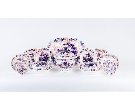 A famille rose pattern part dinner service, possibly Davenport circa 1840, comprising soup tureen and cover, large bowl, 3 en