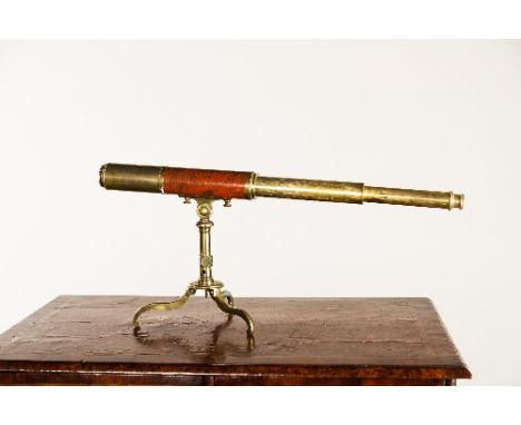 A Dolland of London two-draw brass telescope on folding brass tripod, 80cm extended/see illustration Condition Report: Wear a