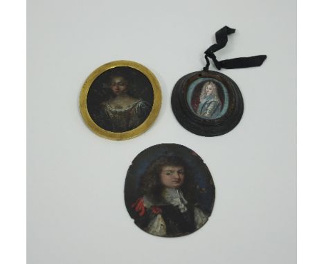 A miniature oil on copper, painted with a portrait of a gentleman, 8cm x 6cm, another smaller of a woman and a miniature pain
