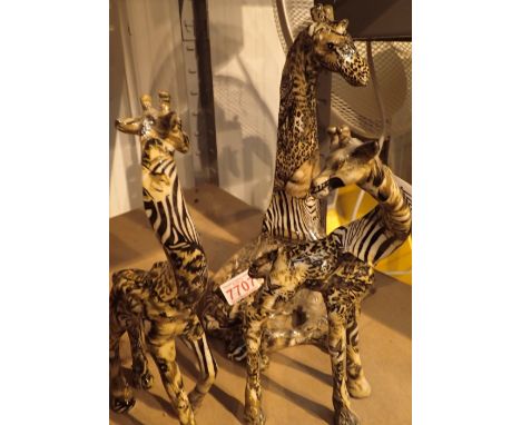 Three unusual giraffe ceramic figurines