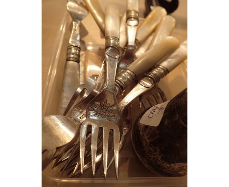Ten presumed Continental silver fish forks with mother of pearl handles and a silver plated pepperette