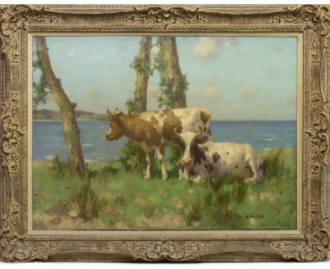 DAVID GAULD RSA (SCOTTISH 1865 - 1936), AYRSHIRE COWS RESTING BY THE SEA, oil on canvas, signed 61cm x 84cm Framed. Note: Dav