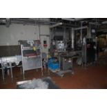 Process Line to Include Package Inverter, Back Card Placer, Bar Code Scanner, RIGGING FEE: $1166.60
