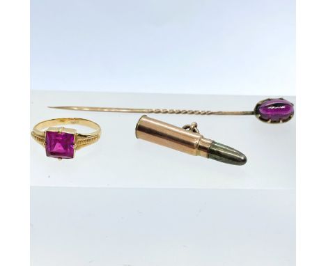 A collection of antique and vintage jewellery. Comprising a garnet cabochon stick pin in unmarked yellow metal; a yellow meta