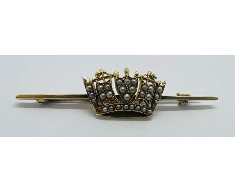 A late 19th century/ early 20th century seed pearl set naval coronet "sweetheart" bar brooch. Stamped "15ct" to the reverse. 