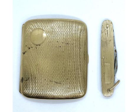 A 9ct gold cigarette case along with a 9ct gold cased pen knife. The cigarette case has an unengraved cartouche and features 