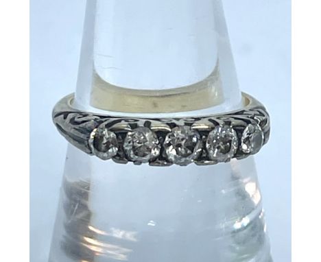 A Victorian graduated five stone Old European cut diamond ring. The central stone measures, face up, approximately 3.4mm in d