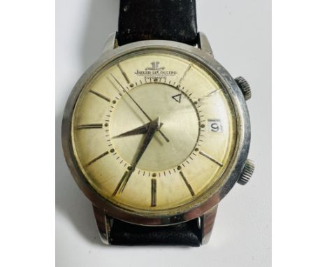 A vintage Jaeger LeCoultre Automatic Memovox Gentleman's wrist watch circa 1960. Featuring a stainless steel case and a leath