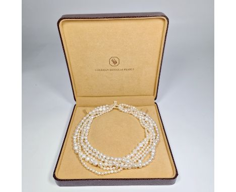 A five-strand Coleman Douglas pearl choker, with a pearl clasp in a Coleman Douglas case, with a sterling silver Coleman Doug