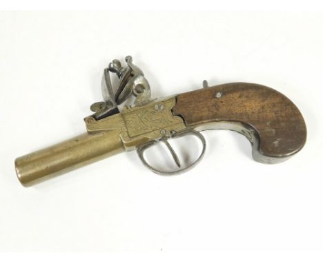 POCKET PISTOL. A late 18th century flintlock pocket pistol, with fixed brass barrel & engraved flattened casing. Slab walnut 