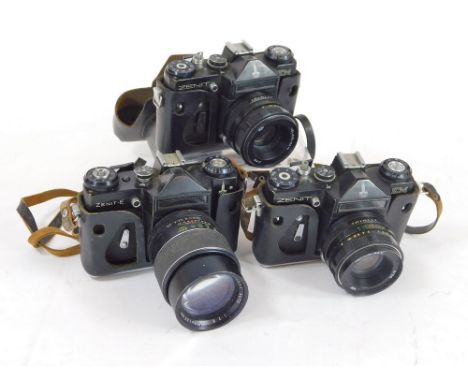 ZENIT OLYMPIC CAMERAS. Three Zenit Moscow Olympics editions: two EM & a E models. CONDITION. See Lot 650 for conditions of sa