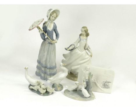 LLADRO ETC. A Lladro figure of a lady with a parasol. Height 31.5cm. Also, a Lladro white porcelain, Collector's Society plaq