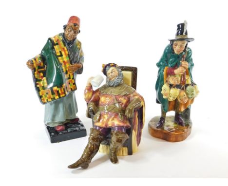 ROYAL DOULTON FIGURES. Royal Doulton figures: Carpet Seller, HN 1464, The Foaming Quart, HN 2162 & The Mask Seller, HN 2103. 