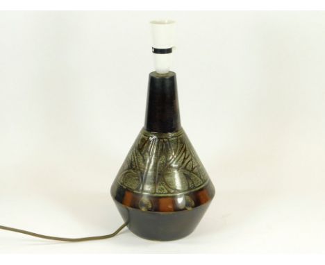 CELTIC POTTERY. A Celtic Pottery, Newlyn, Medallion pattern lamp base. Height excluding fitting 27cm.  Please note that all i