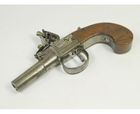POCKET PISTOL. A late 18th/early 19th century flintlock pocket pistol with turn-off barrel & indistinctly engraved & named gu