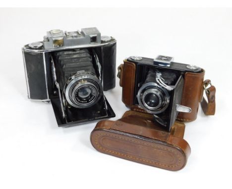 JAPANESE CAMERAS. A Japanese Baby Pearl with case & a KSK early Japanese roll film camera.  CONDITION. See Lot 725 for condit