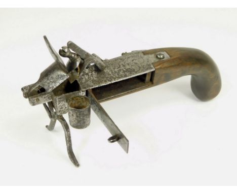 TINDER LIGHTER. A late 18th century steel flintlock pistol tinder lighter. Length 19.5cm.  Please note that all items in this