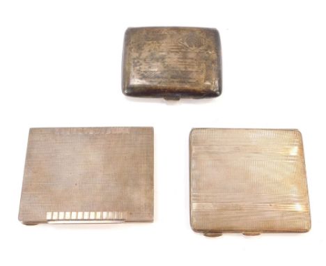 A George VI silver cigarette case, with engine turned decoration, vacant rectangular shield reserve, Birmingham 1945, a Georg